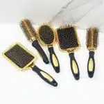 Brosse à cheveux avec coussin d'air et poignée ergonomique antidérapante dorée - Lot de 5 Peignes