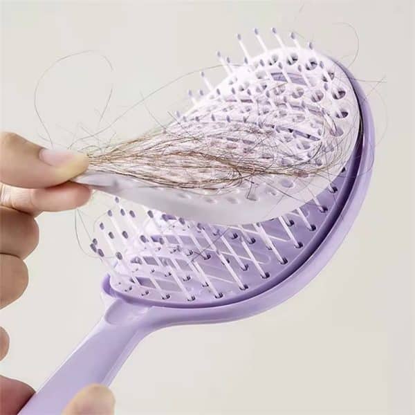 Brosse démêlante autonettoyante à dents épaissies pour cheveux bouclés