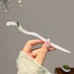Epingle-a-cheveux-florale-en-resine-nacree-et-doree-5936