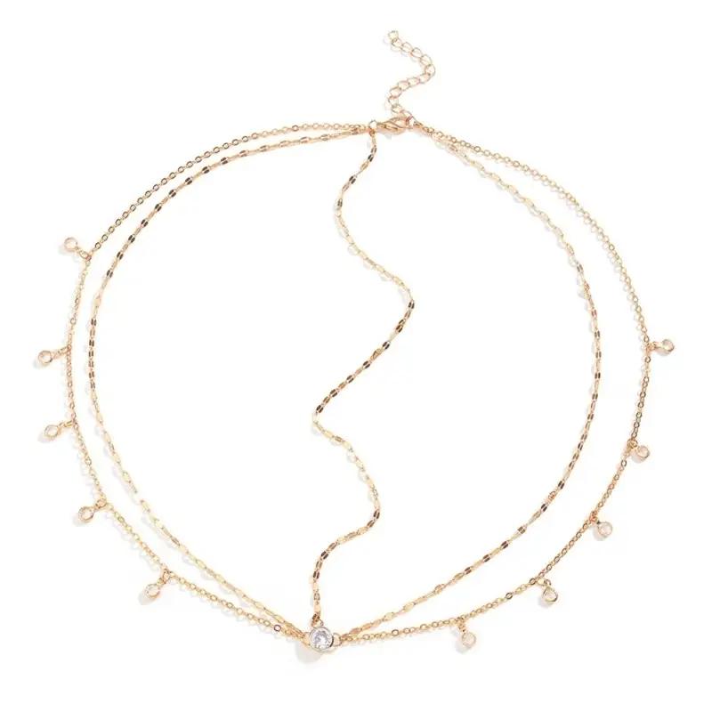 Gioiello per capelli (headpiece) a catenelle sovrapposte decorato con strass e perle