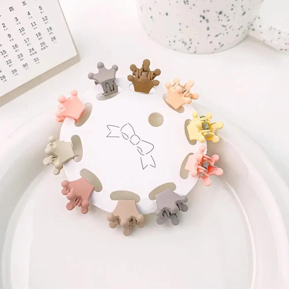 Set di 10 mollette per capelli decorative con forme fantasia per bambini - Corona
