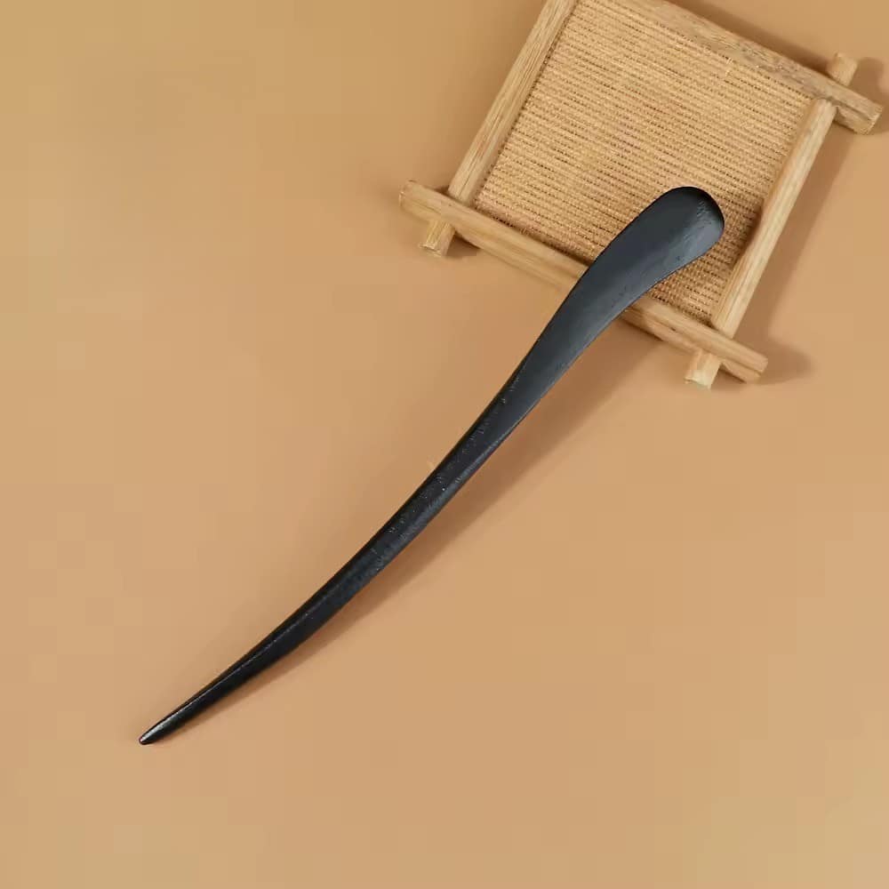 Forcina per capelli in legno nero in stile asiatico con estremità scolpita