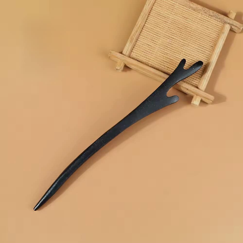 Forcina per capelli in legno nero in stile asiatico con estremità scolpita
