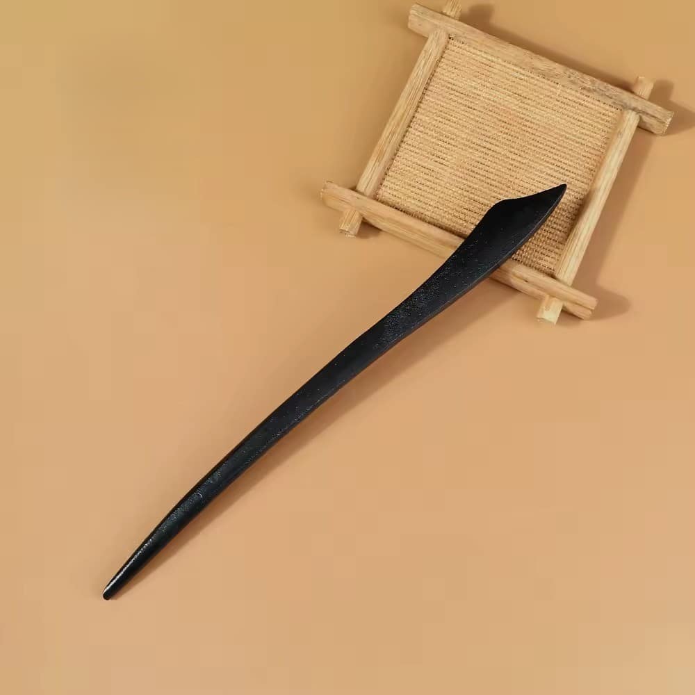 Forcina per capelli in legno nero in stile asiatico con estremità scolpita
