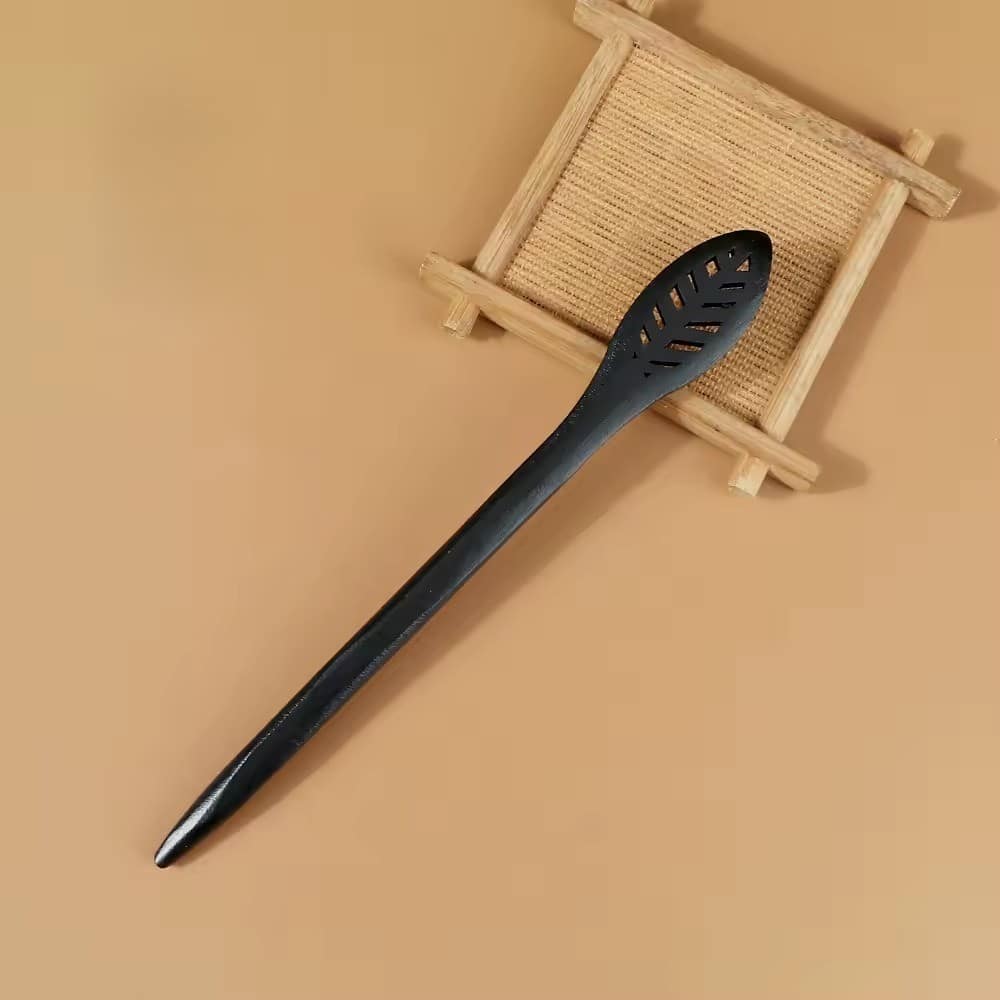 Forcina per capelli in legno nero in stile asiatico con estremità scolpita