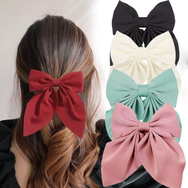 Barrette queue de cheval nœud en satin