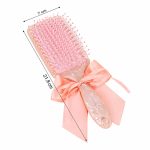 Brosse-a-cheveux-demelante-avec-ruban-technique-1118